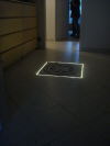 Rosone beleuchtet im Fußboden